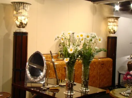 antique mirror with floral decorations in an elegant setting