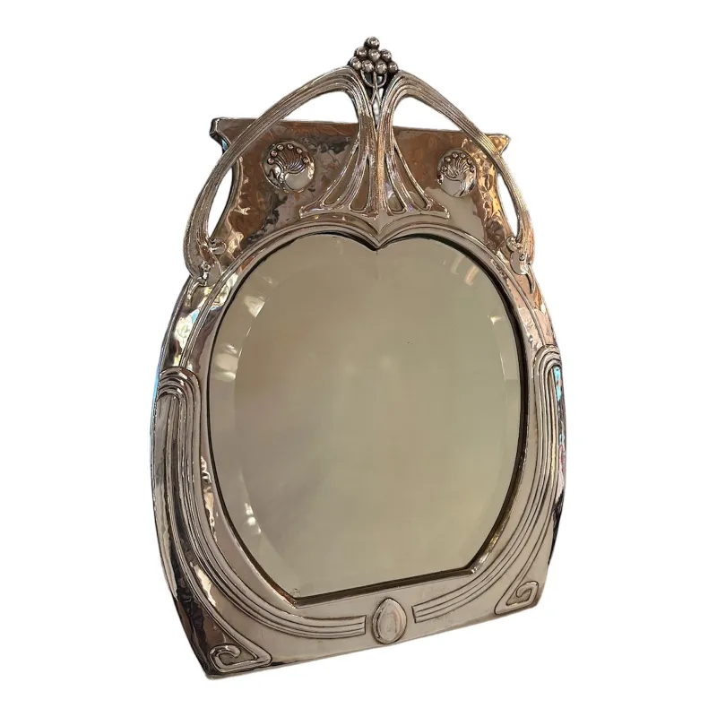 antique Art Nouveau mirror with decorative shape