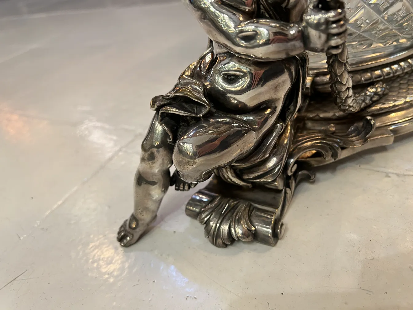 antique centerpiece with decorative figure in elegant style