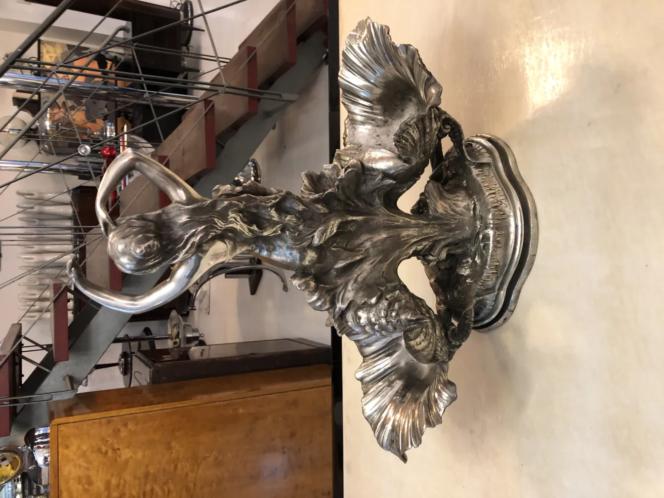 Antique centerpiece with delicate design, in a modern setting