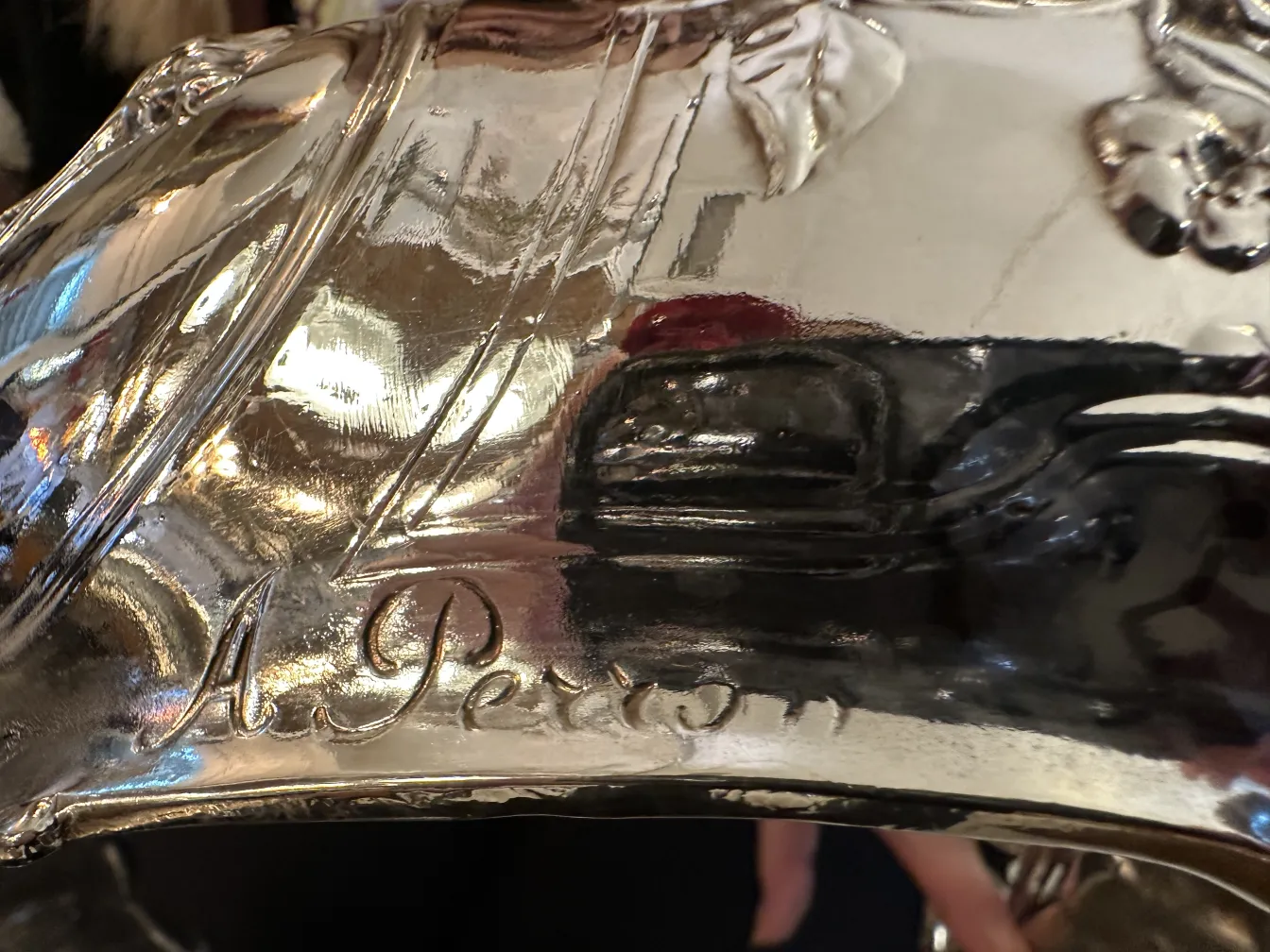 antique centerpiece featuring inscriptions and elegant details