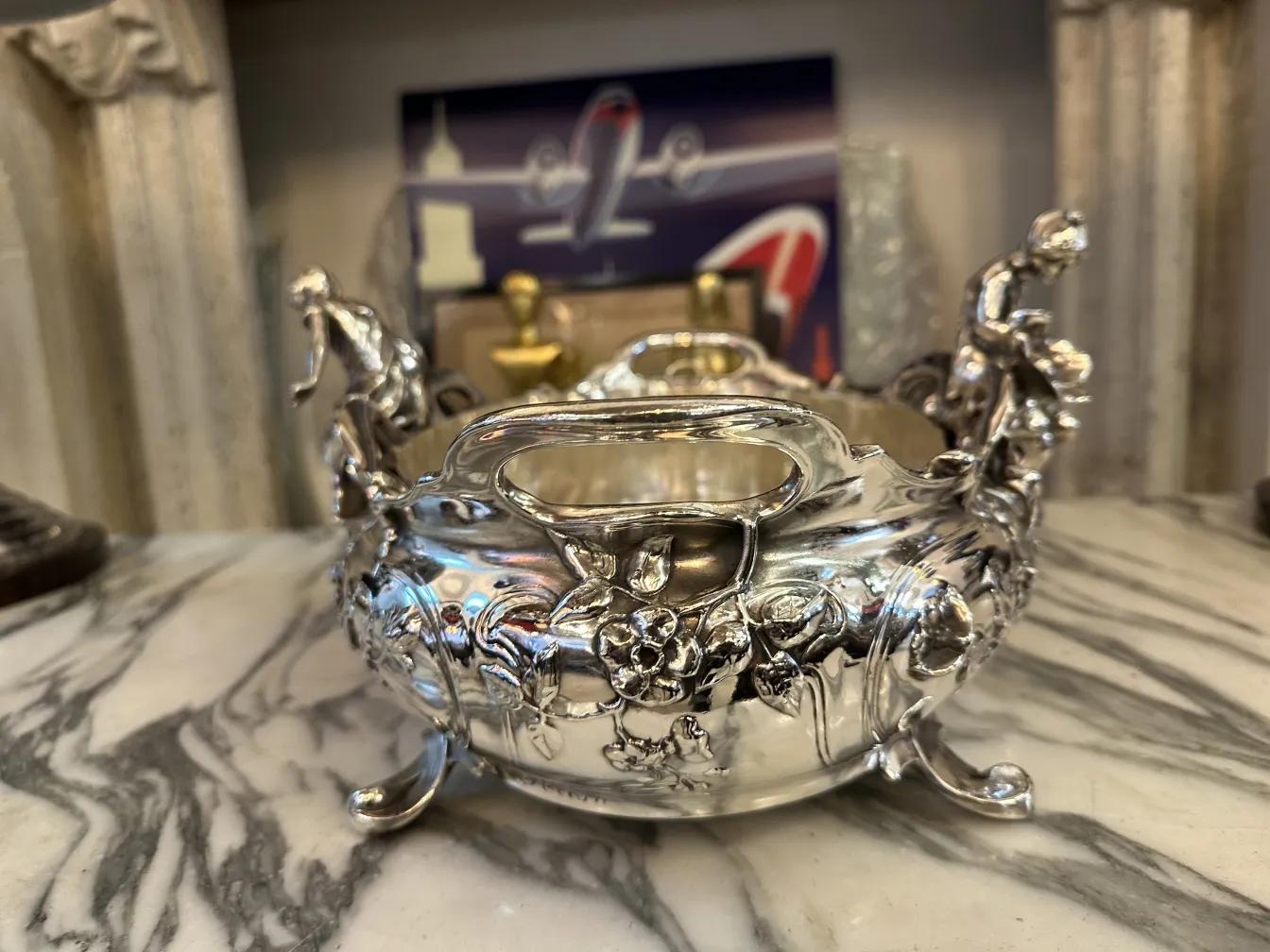 antique round centerpiece with sculptural decorations