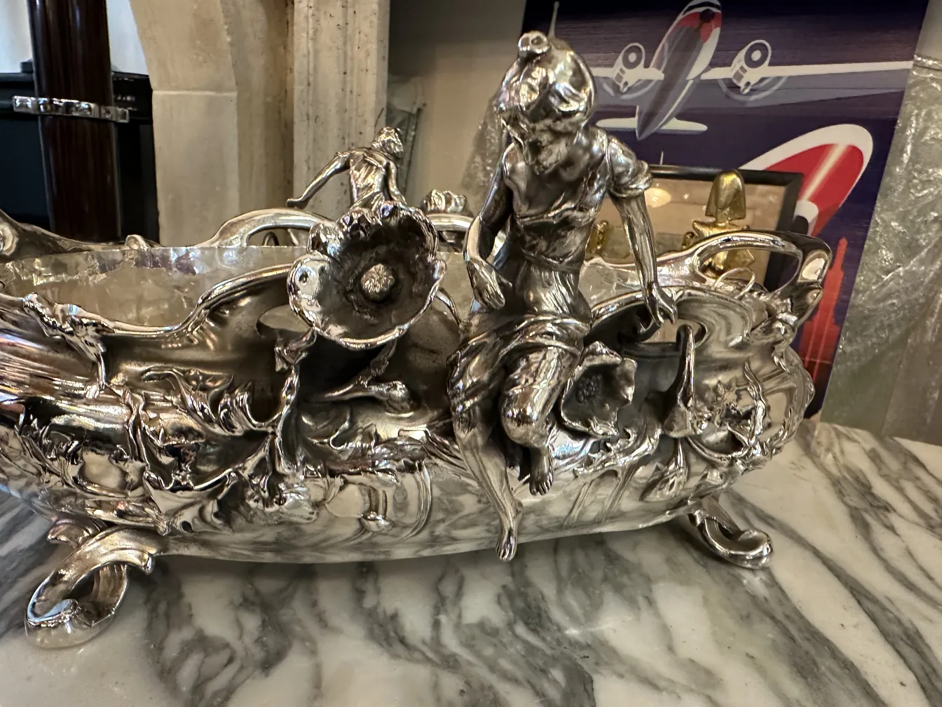 antique centerpiece with embossed decorative details