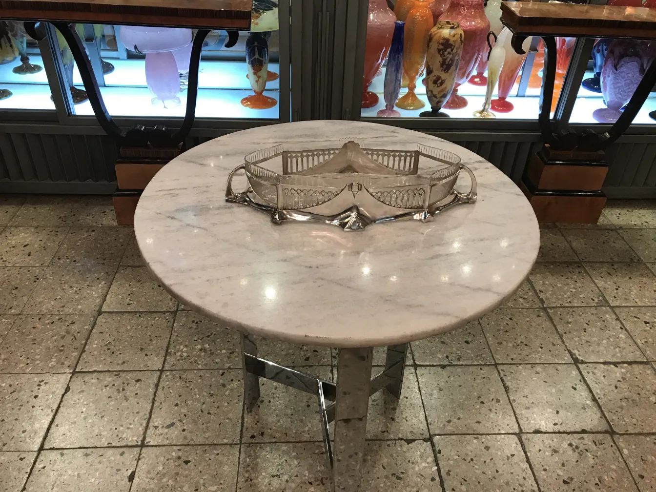 wmff antique decorative centerpiece with elegant design on marble table