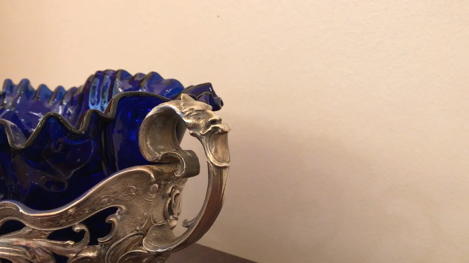 Antique WMF centerpiece featuring a blue design and intricate details