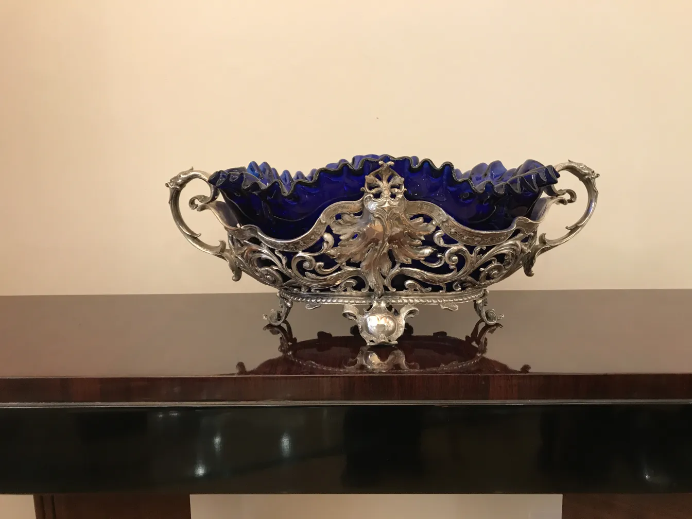 Antique WMF centerpiece in blue with decorative elements.