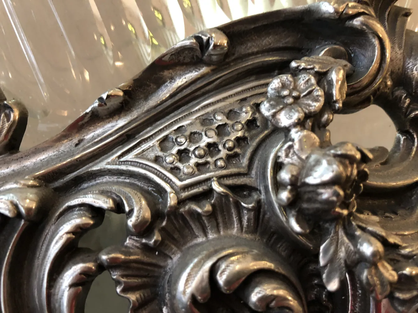 Antique WMF centerpiece with floral design and decorative finish, perfect for elegant tables.