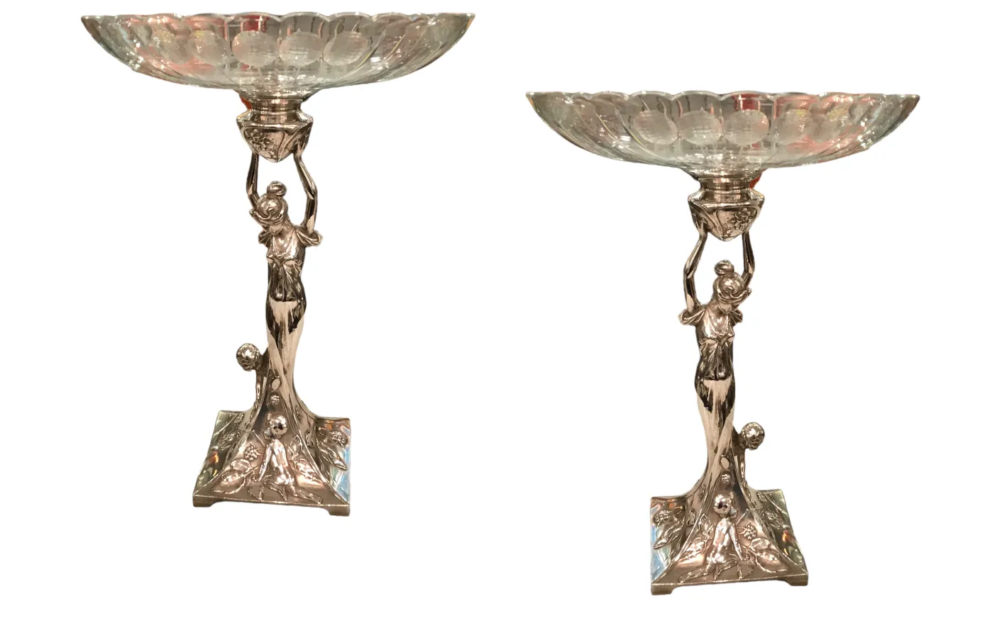 jardinera antigua wmfg con base decorativa y figura elegante