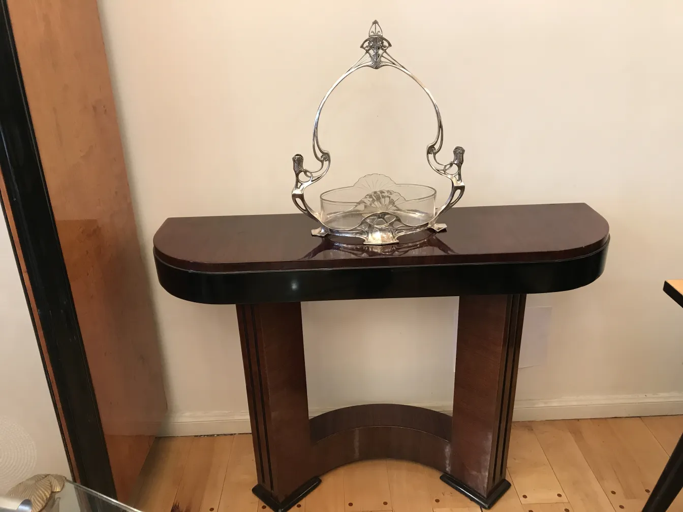 antique WMF centerpiece on wooden table, elegantly displayed