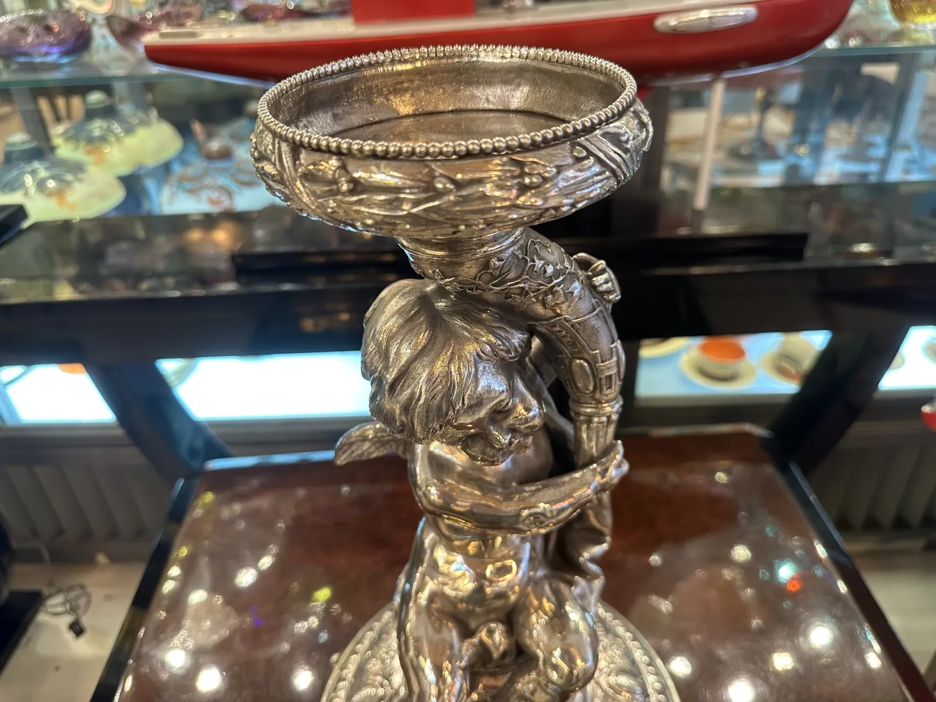 decorative centerpiece wmfs with cherub figure and elegant rim, antique