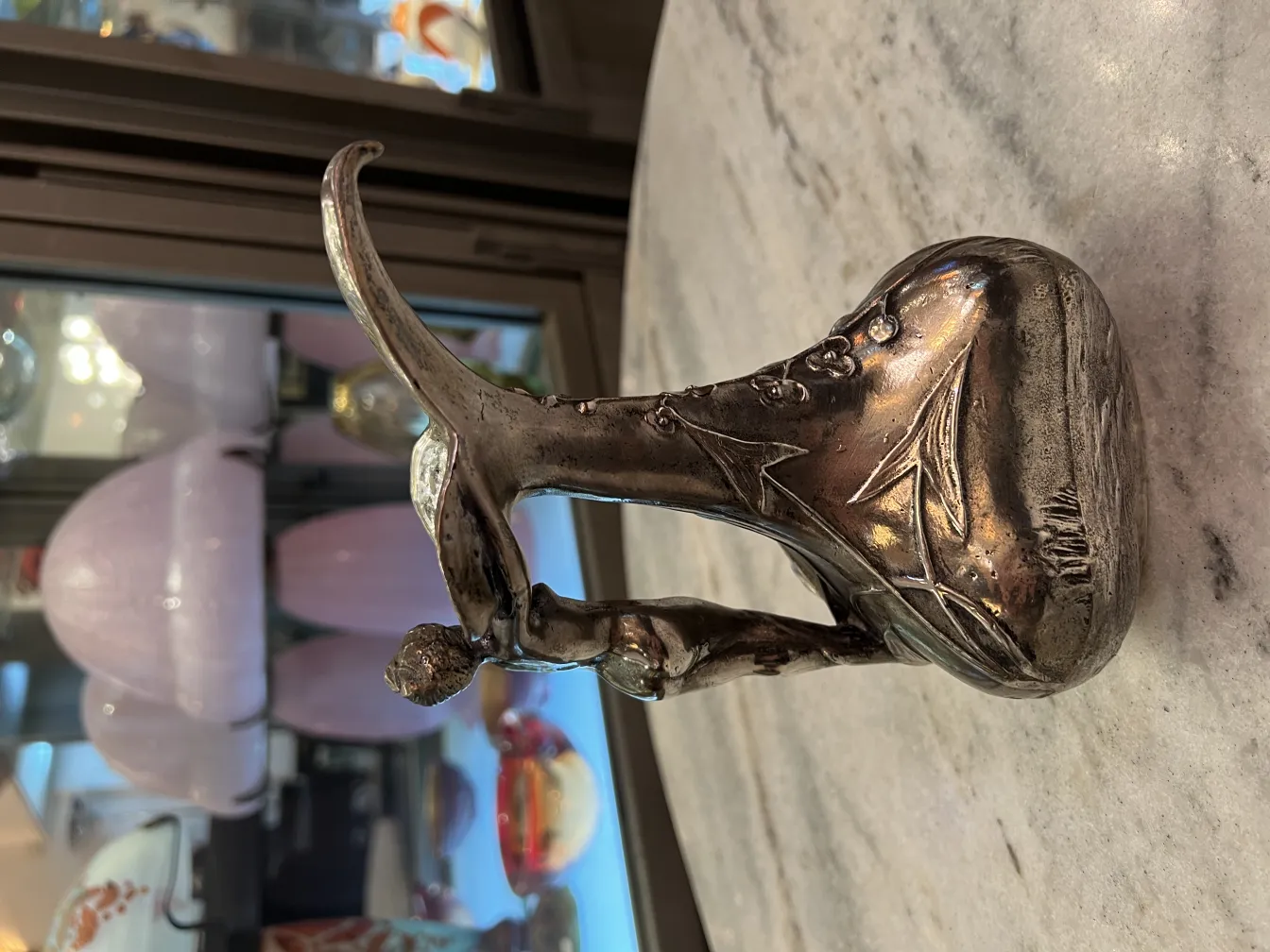 decorative antique jar on a marble surface