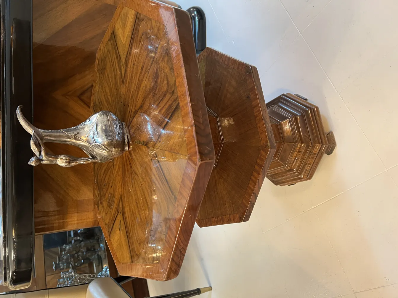 antique jar with decorative detail and octagonal base