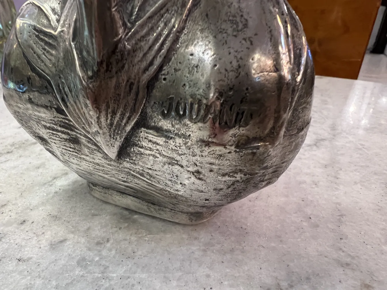 antique jar with a unique and detailed design