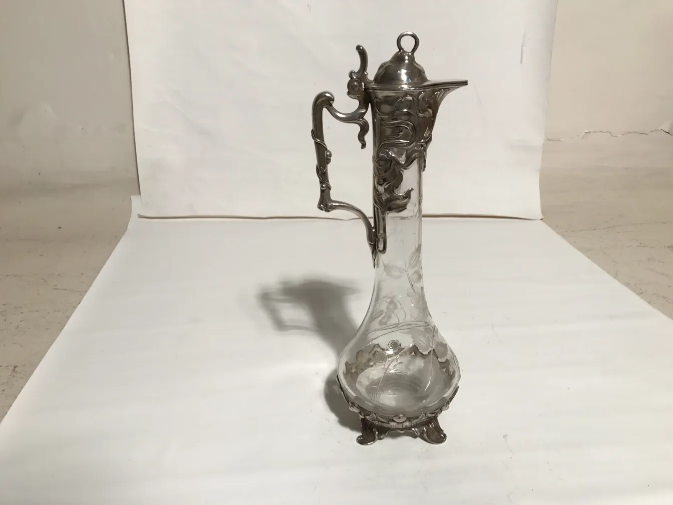 antique WMF jars with intricate design on the base and spout