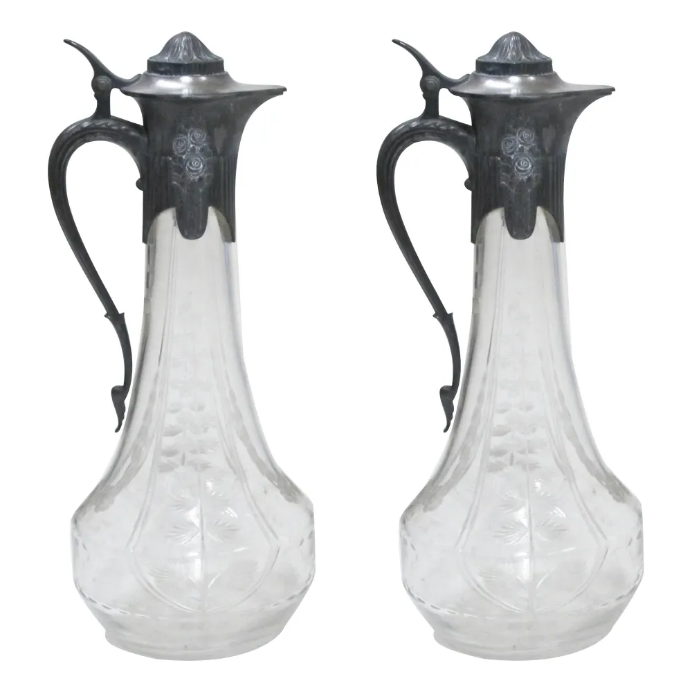 two antique jars with an elegant and distinctive design