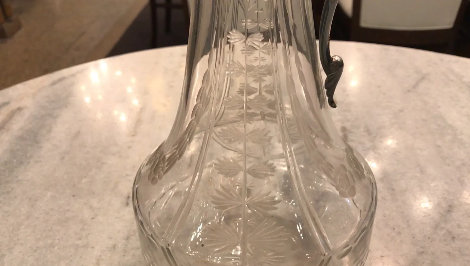 Set of 2 antique wmfs jars with elegant design on the table.