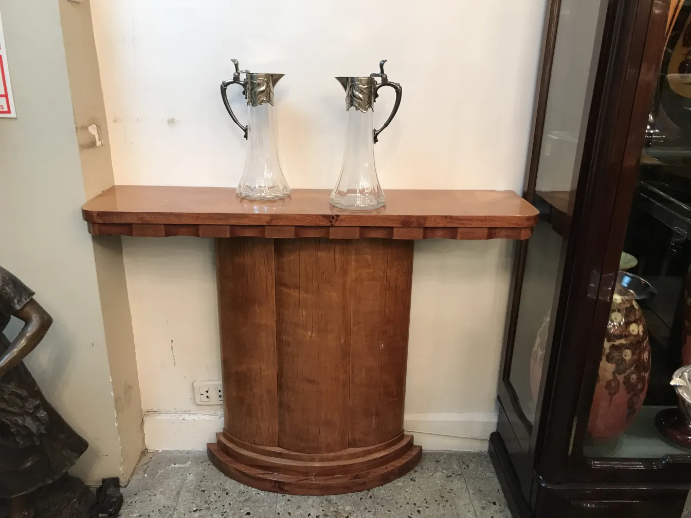 two antique WMF jars on a wooden table