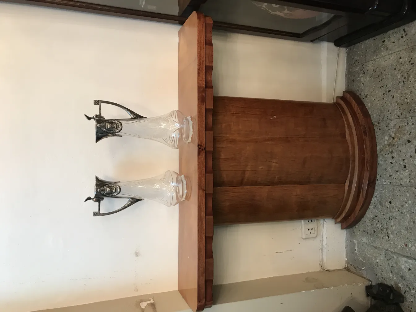 two antique WMF jars on a wooden table