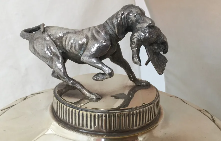 Scene of two antique champagne coolers wmff with dog detail