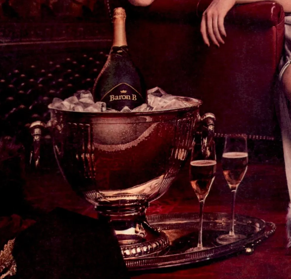 two antique wmf champagne coolers with bottle and glasses