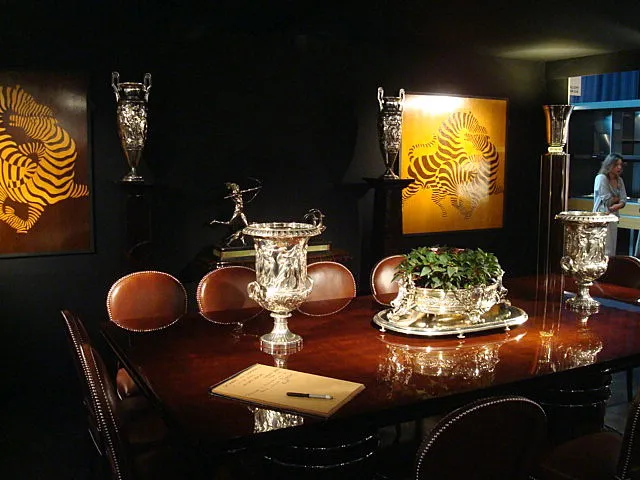 Set of 2 antique champagne coolers in an elegant environment.