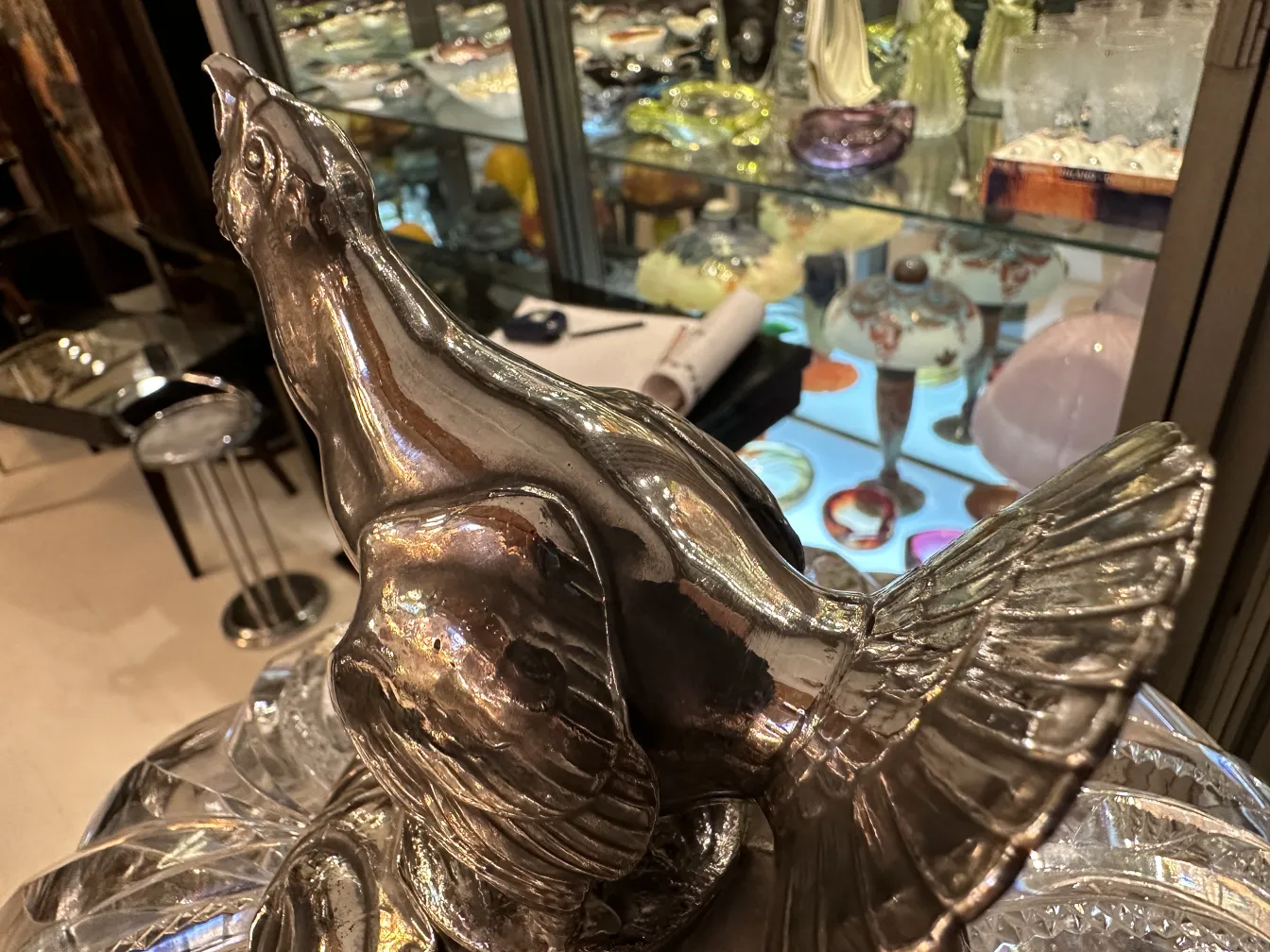 Antique WMF punch bowl featuring bird designs on the edge