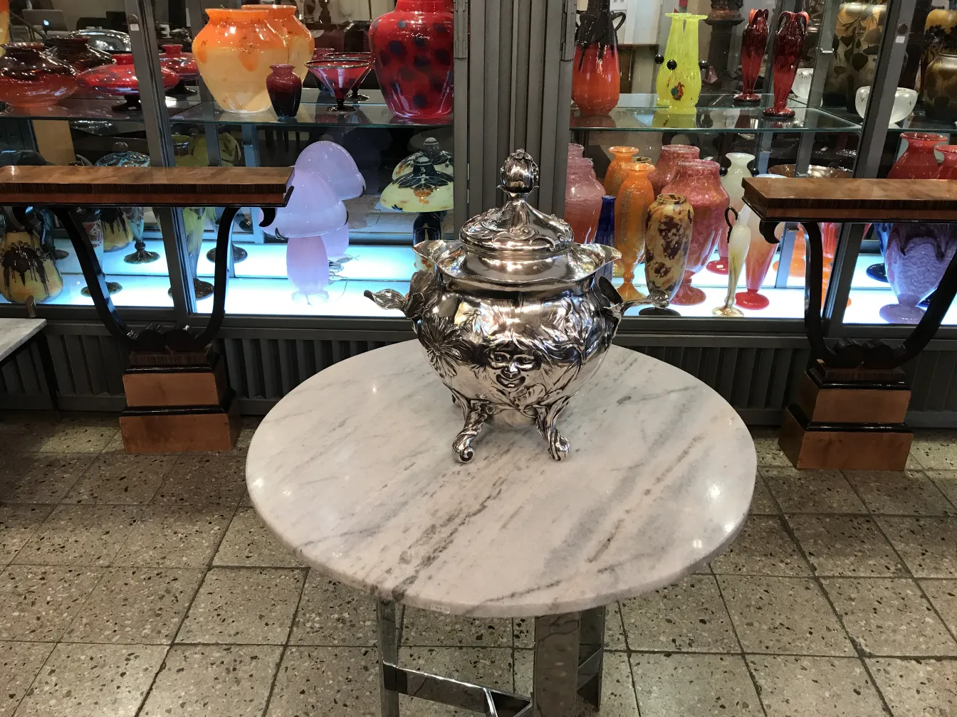 Antique WMF punch bowl with intricate details in a vintage setting