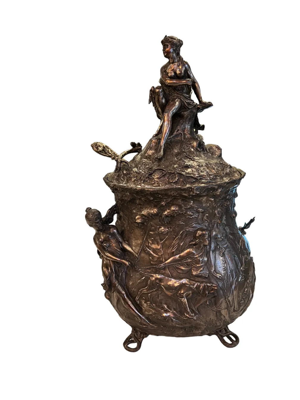 Detailed view of an antique WMF punch bowl with figures, relief decorations