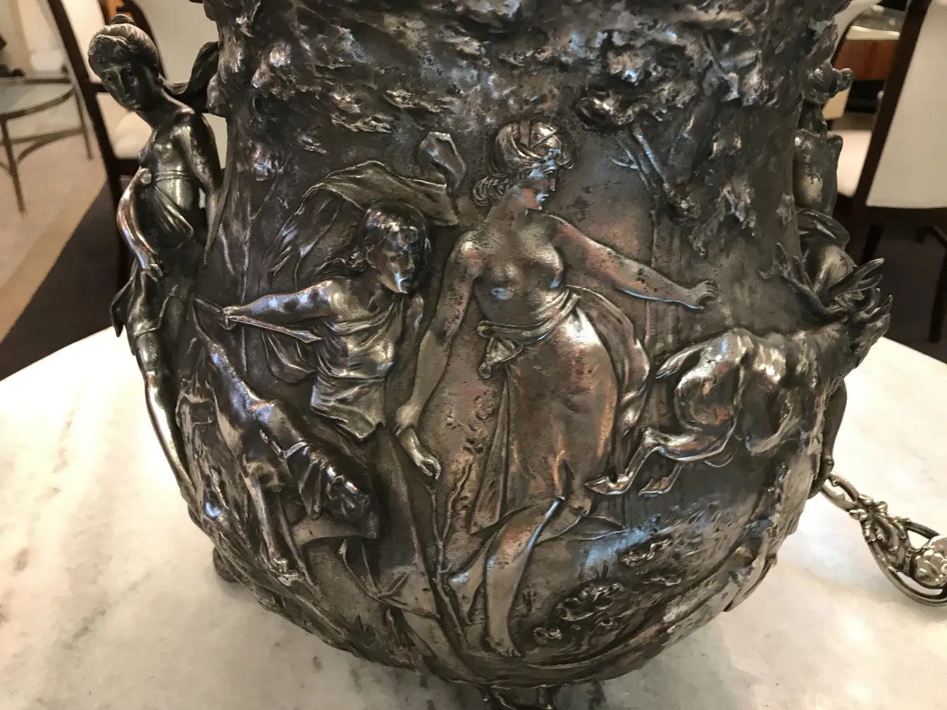 Antique WMF punch bowl with elaborate decorative details.