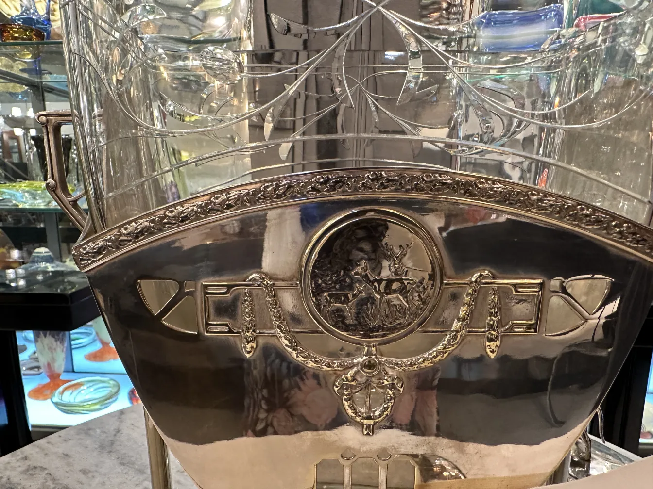 Antique WMF punch bowl with decorative details and elegant shape.