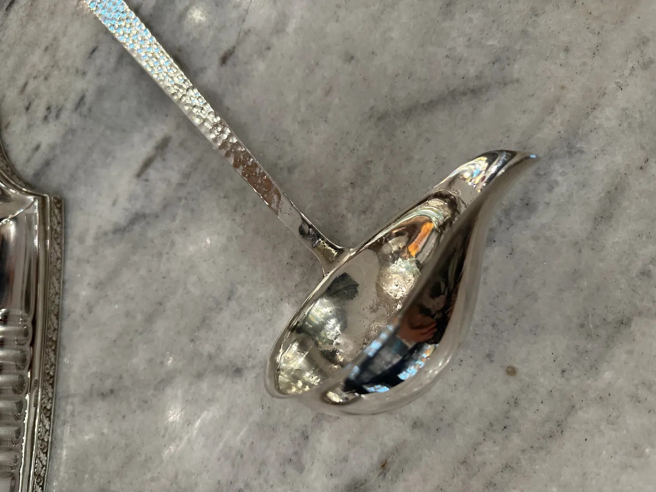 Image of an antique WMF punch bowl featuring elegant design