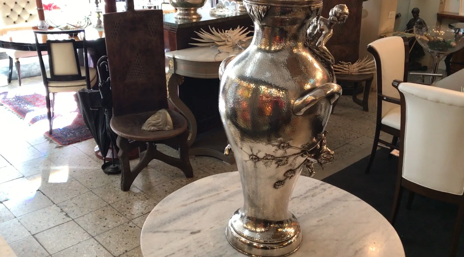 antique Orivit vase with intricate design in chic setting