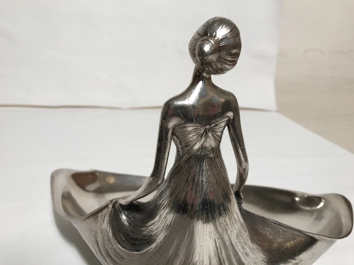 antique orivit card tray with decorative figure