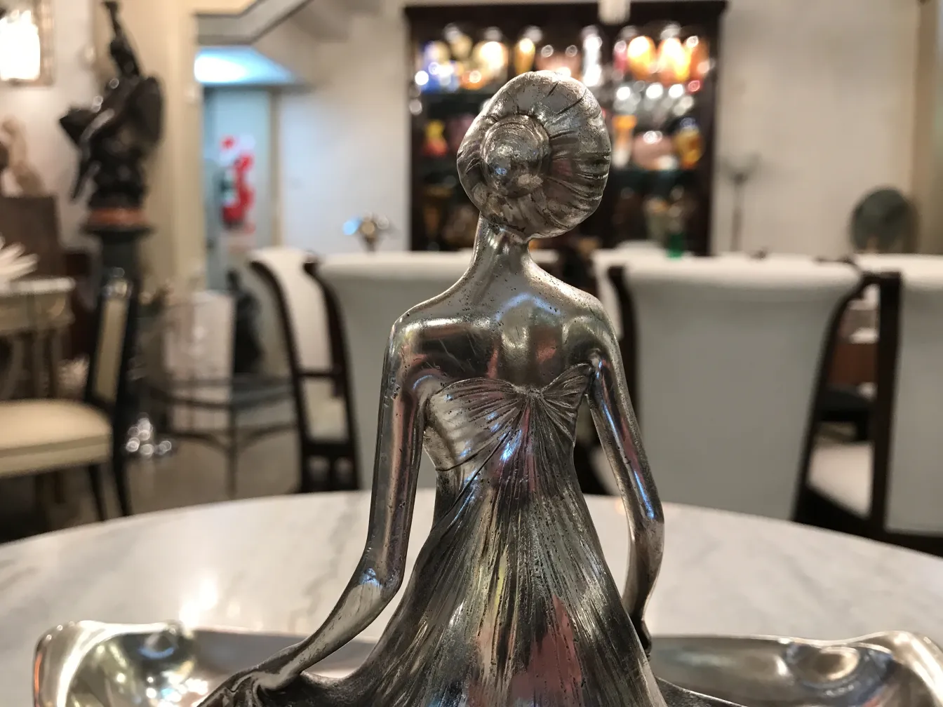 antique card tray ORIVIT featuring a decorative figure in an elegant setting