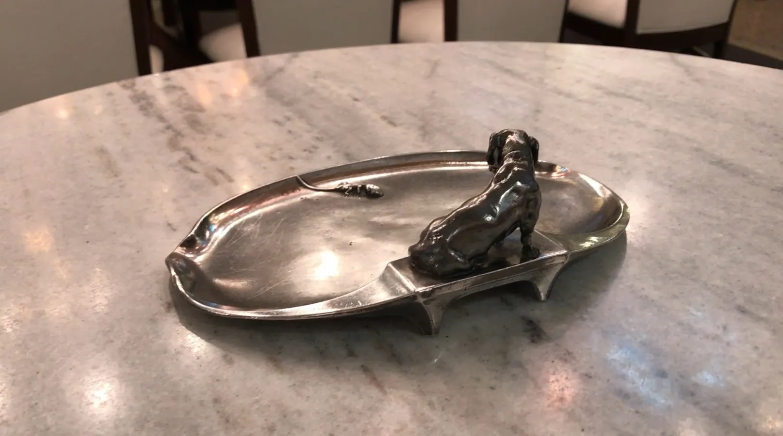 antique card tray WMF featuring a dog in a cozy setting