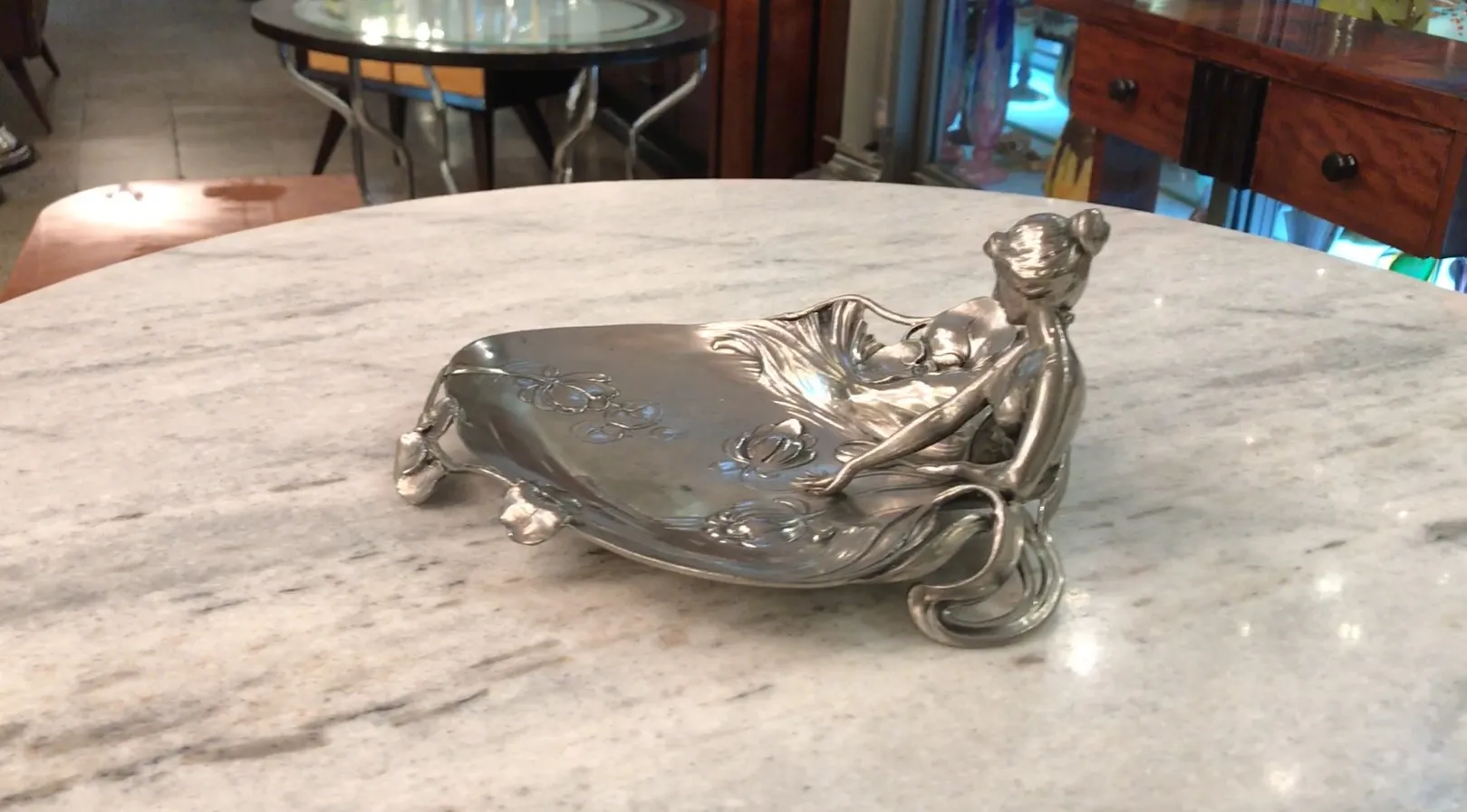 antique card tray with female figure, decorative, on marble