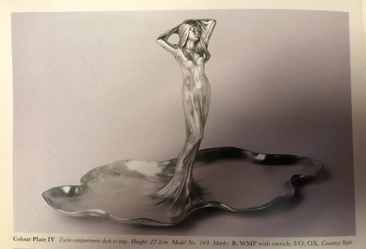 Antikes Kartenfach WMF mit elegant gestalteter Figur in der Mitte.