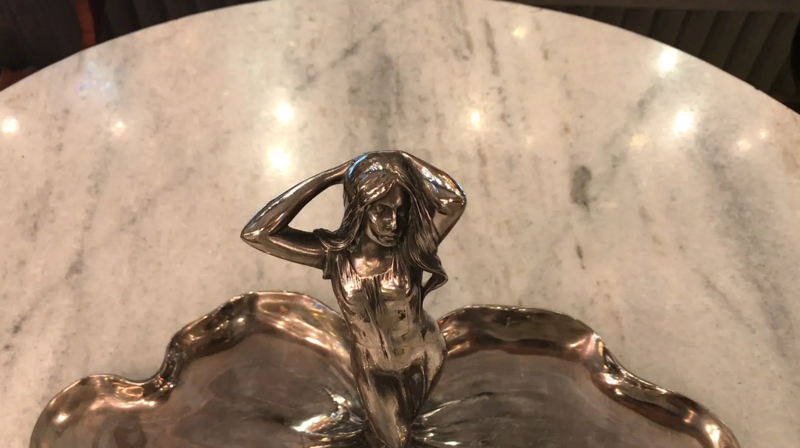 antique WMF card tray with decorative figure