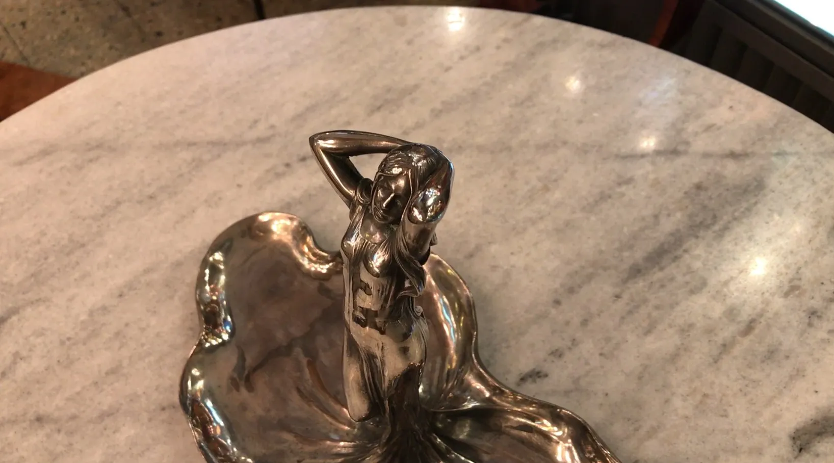 antique WMF card tray featuring a female figure