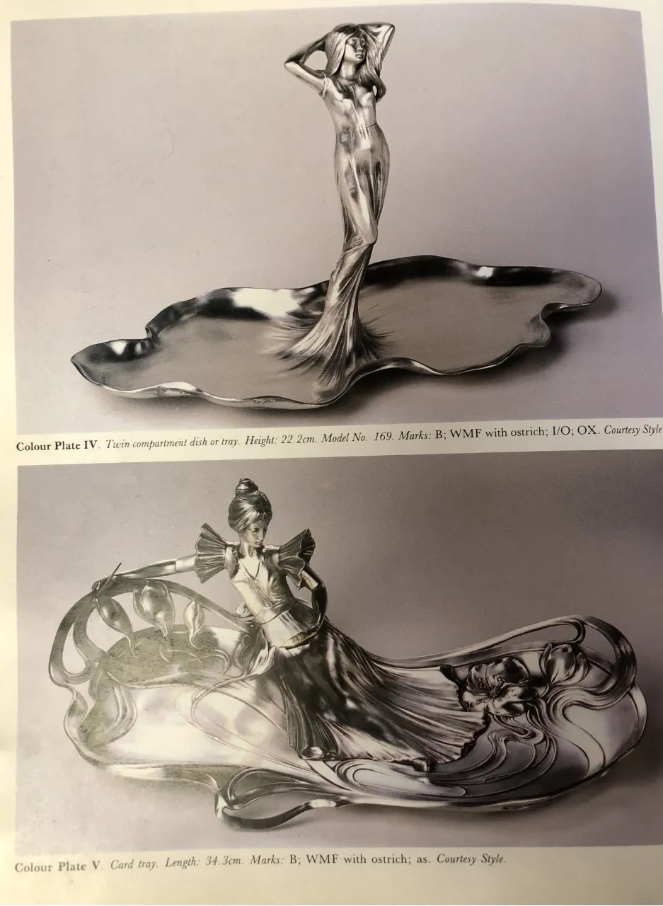 Vassoi per carte antichi WMF con figura scolpita e forma elegante, decorativi e funzionali in ambienti classici.