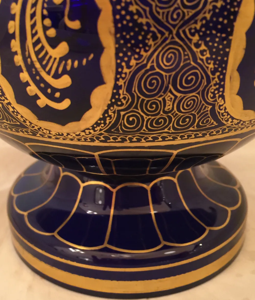 antique candy box with golden patterns on blue background