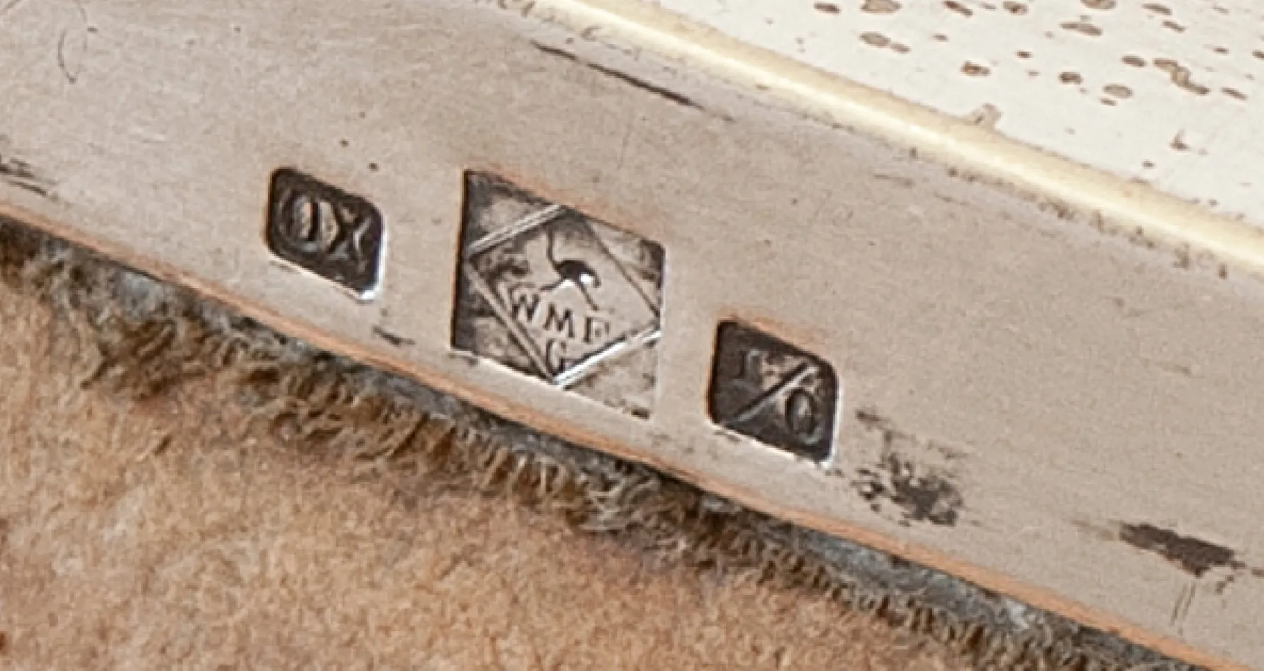 two antique jewel boxes with decorative details