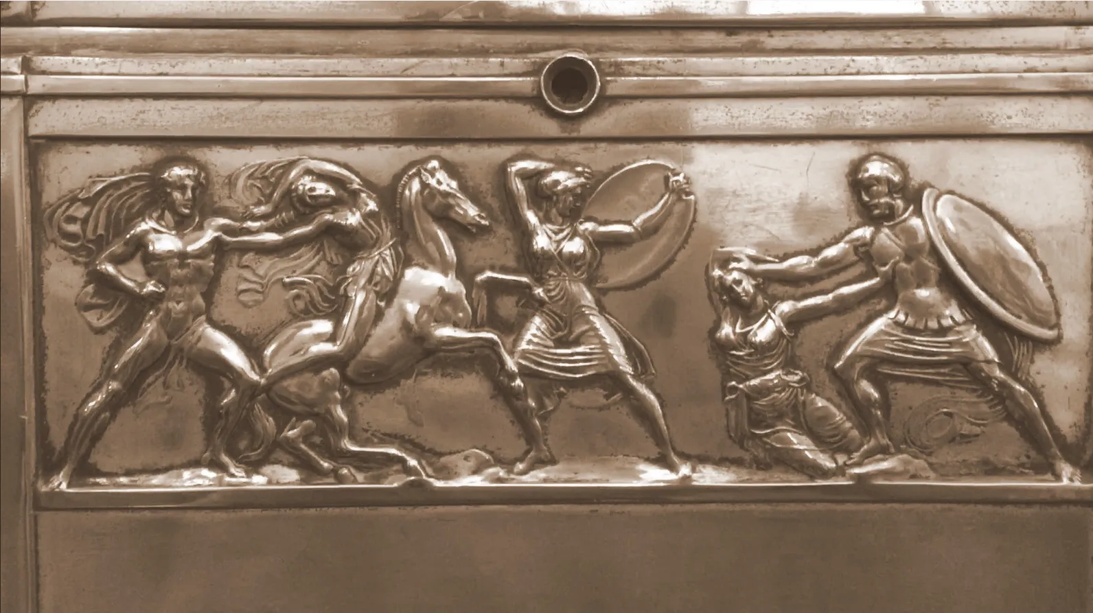 Ancient jewelers featuring mythological reliefs and elaborate details