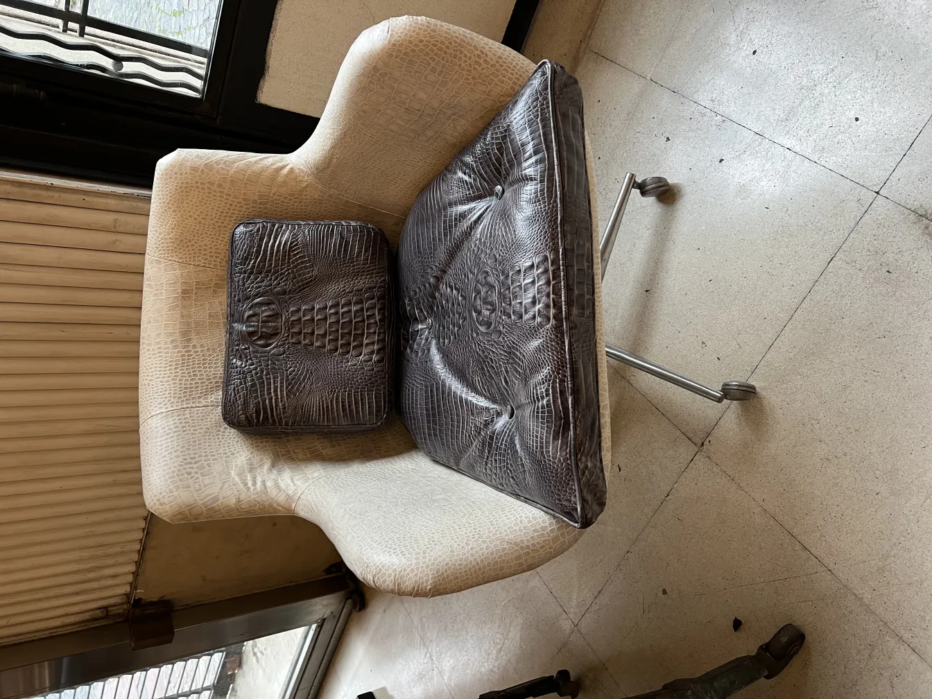 Antique armchair with soft cushions in a cozy setting