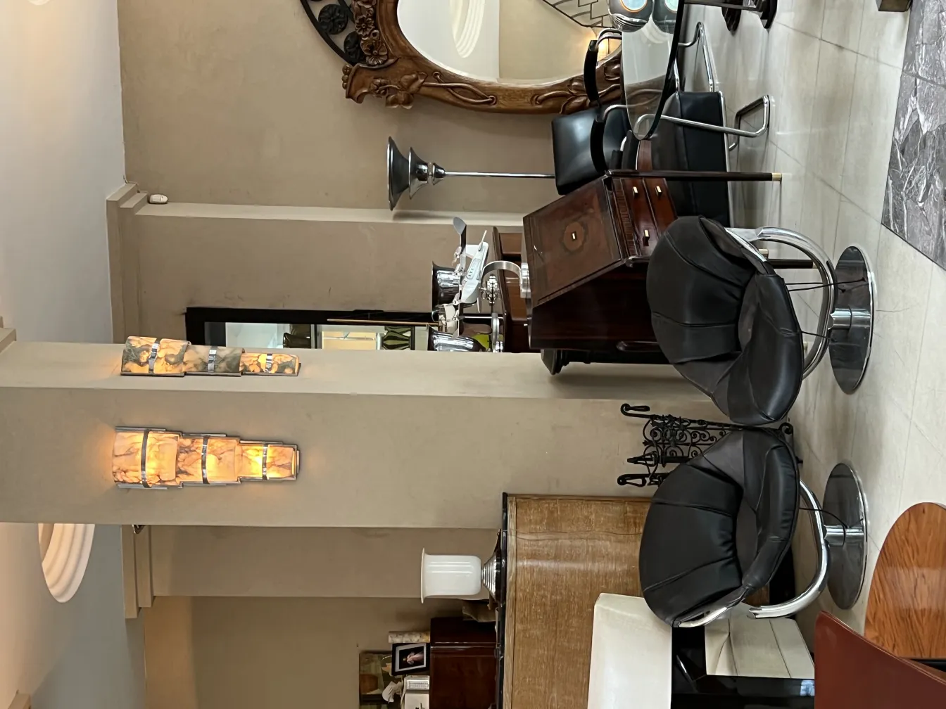 2 antique armchairs in an elegant setting with soft light