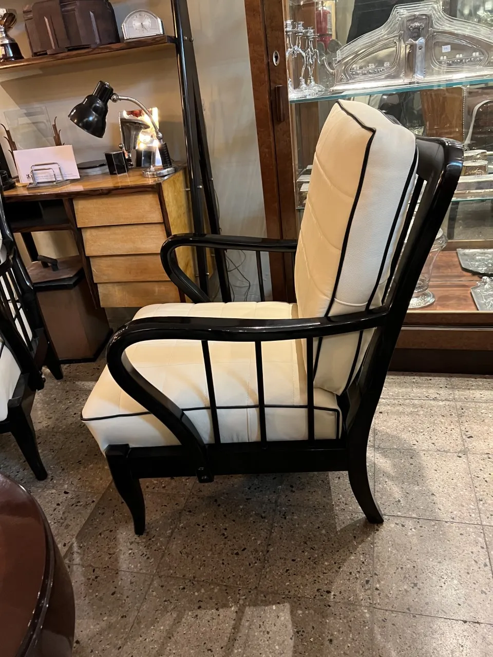 Two antique armchairs in a cozy setting, showcasing an appealing and comfortable design