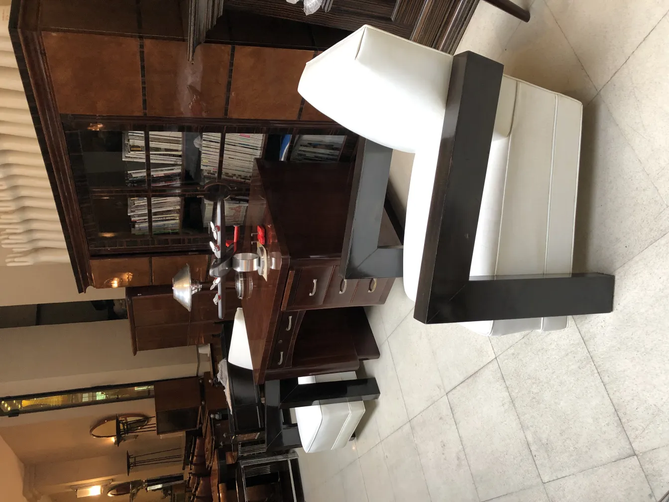 two antique armchairs with an elegant design in a cozy setting.