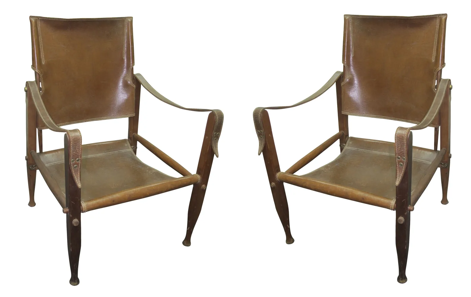 two antique armchairs with straight backs and arms