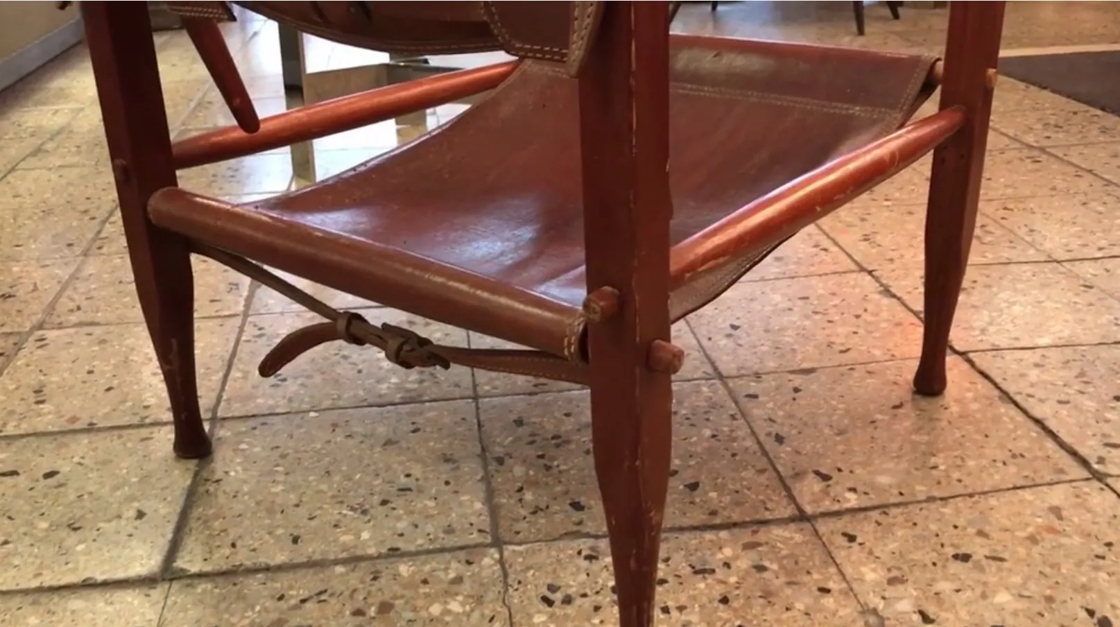 Two antique armchairs featuring unique details from Kaaren Klint, in a cozy setting.