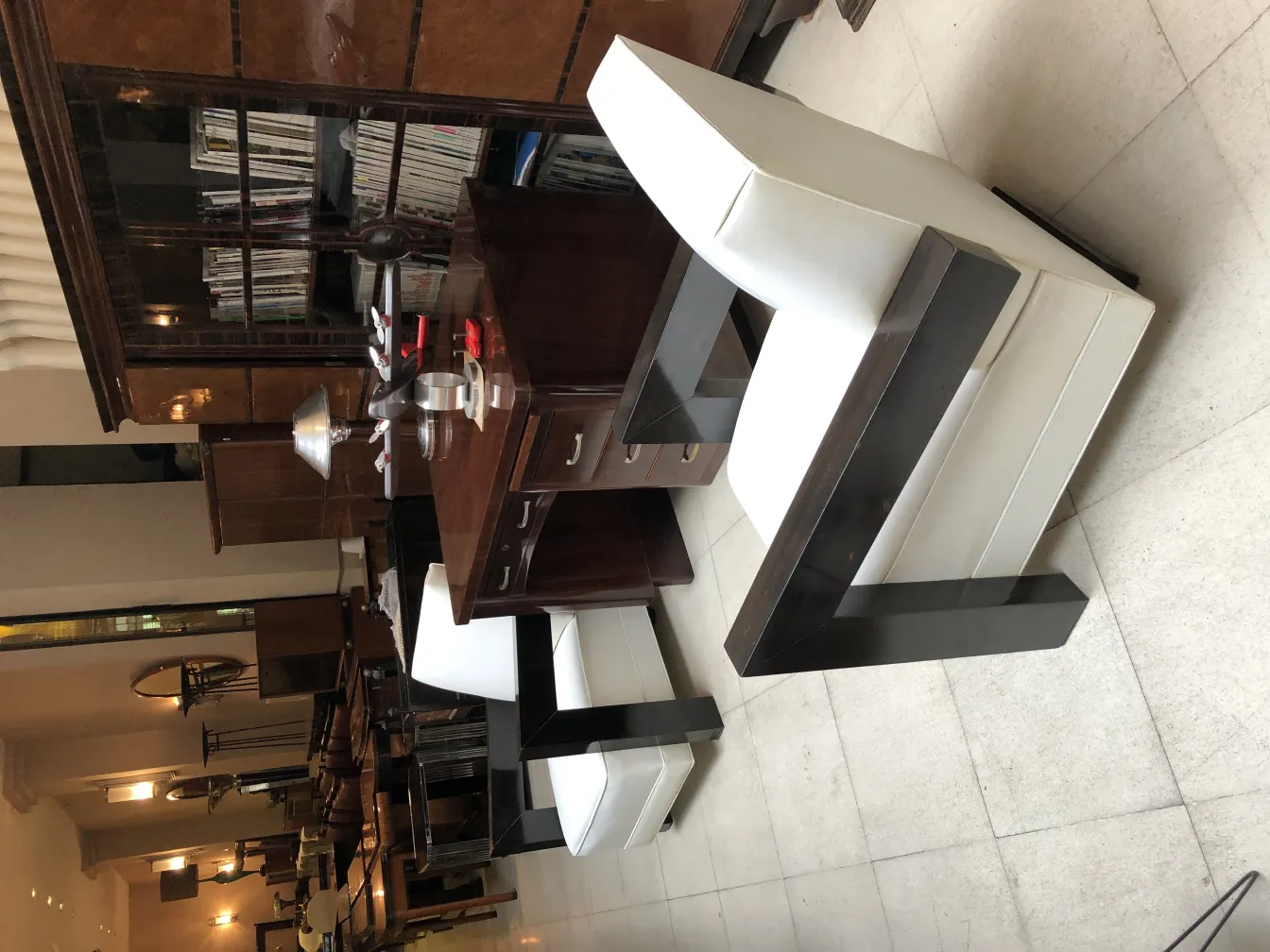 2 antique armchairs with elegant structure in a cozy setting